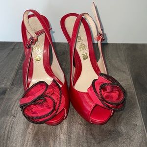 Gorgeous red heels with adjustable straps